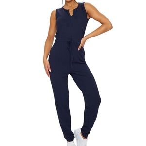Prettylittlething Navy V Neck Tie Waist Rib Jumpsuit